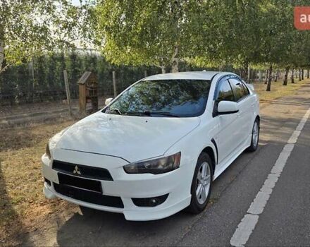 Білий Міцубісі Lancer, об'ємом двигуна 2 л та пробігом 185 тис. км за 7600 $, фото 2 на Automoto.ua