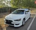 Білий Міцубісі Lancer, об'ємом двигуна 2 л та пробігом 185 тис. км за 7600 $, фото 2 на Automoto.ua
