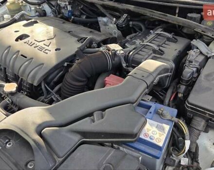Білий Міцубісі Lancer, об'ємом двигуна 2 л та пробігом 185 тис. км за 7600 $, фото 16 на Automoto.ua