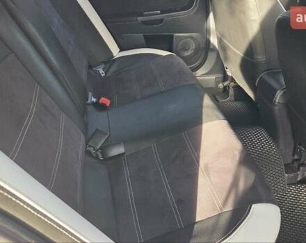 Білий Міцубісі Lancer, об'ємом двигуна 2 л та пробігом 185 тис. км за 7600 $, фото 9 на Automoto.ua