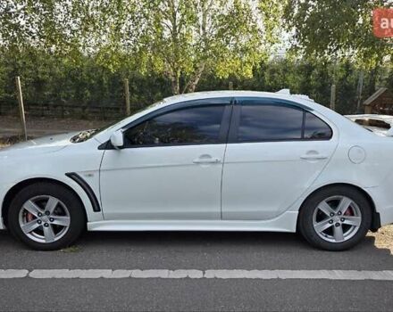 Білий Міцубісі Lancer, об'ємом двигуна 2 л та пробігом 185 тис. км за 7600 $, фото 6 на Automoto.ua