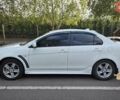 Білий Міцубісі Lancer, об'ємом двигуна 2 л та пробігом 185 тис. км за 7600 $, фото 6 на Automoto.ua