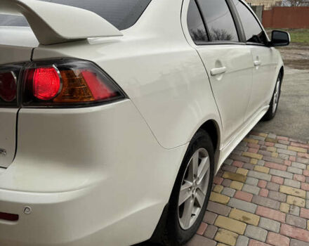 Білий Міцубісі Lancer, об'ємом двигуна 2 л та пробігом 269 тис. км за 6000 $, фото 7 на Automoto.ua