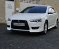 Білий Міцубісі Lancer, об'ємом двигуна 2 л та пробігом 140 тис. км за 8300 $, фото 1 на Automoto.ua