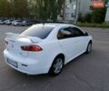 Белый Мицубиси Лансер, объемом двигателя 2 л и пробегом 240 тыс. км за 6999 $, фото 6 на Automoto.ua