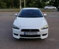 Білий Міцубісі Lancer, об'ємом двигуна 2 л та пробігом 240 тис. км за 6999 $, фото 1 на Automoto.ua