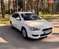 Белый Мицубиси Лансер, объемом двигателя 1.5 л и пробегом 163 тыс. км за 6300 $, фото 1 на Automoto.ua