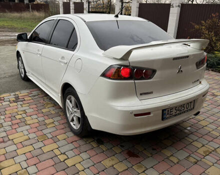 Білий Міцубісі Lancer, об'ємом двигуна 2 л та пробігом 269 тис. км за 6000 $, фото 4 на Automoto.ua