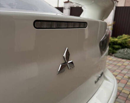 Білий Міцубісі Lancer, об'ємом двигуна 2 л та пробігом 269 тис. км за 6000 $, фото 6 на Automoto.ua