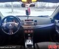 Білий Міцубісі Lancer, об'ємом двигуна 2 л та пробігом 210 тис. км за 7500 $, фото 7 на Automoto.ua