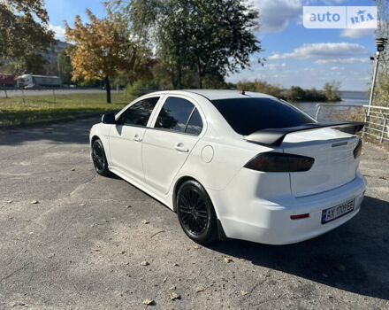 Білий Міцубісі Lancer, об'ємом двигуна 2 л та пробігом 198 тис. км за 10000 $, фото 6 на Automoto.ua