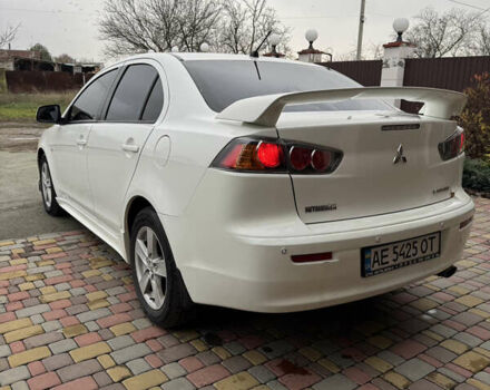 Білий Міцубісі Lancer, об'ємом двигуна 2 л та пробігом 269 тис. км за 6000 $, фото 3 на Automoto.ua