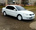 Белый Мицубиси Лансер, объемом двигателя 1.6 л и пробегом 237 тыс. км за 6000 $, фото 10 на Automoto.ua