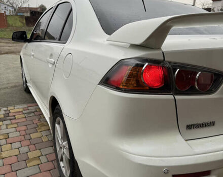 Білий Міцубісі Lancer, об'ємом двигуна 2 л та пробігом 269 тис. км за 6000 $, фото 5 на Automoto.ua