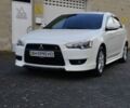 Белый Мицубиси Лансер, объемом двигателя 2 л и пробегом 140 тыс. км за 8300 $, фото 1 на Automoto.ua