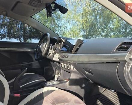Білий Міцубісі Lancer, об'ємом двигуна 2 л та пробігом 185 тис. км за 7600 $, фото 11 на Automoto.ua