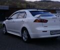 Білий Міцубісі Lancer, об'ємом двигуна 2 л та пробігом 140 тис. км за 8300 $, фото 2 на Automoto.ua
