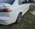 Белый Мицубиси Лансер, объемом двигателя 2 л и пробегом 255 тыс. км за 7350 $, фото 6 на Automoto.ua