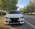 Білий Міцубісі Lancer, об'ємом двигуна 2 л та пробігом 185 тис. км за 7600 $, фото 1 на Automoto.ua