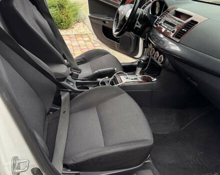 Білий Міцубісі Lancer, об'ємом двигуна 2 л та пробігом 269 тис. км за 6000 $, фото 17 на Automoto.ua