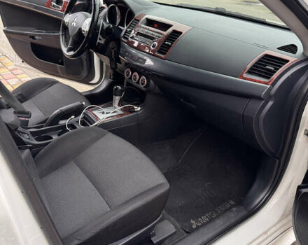 Білий Міцубісі Lancer, об'ємом двигуна 2 л та пробігом 269 тис. км за 6000 $, фото 16 на Automoto.ua