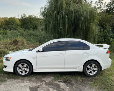 Білий Міцубісі Lancer, об'ємом двигуна 2 л та пробігом 269 тис. км за 6000 $, фото 2 на Automoto.ua