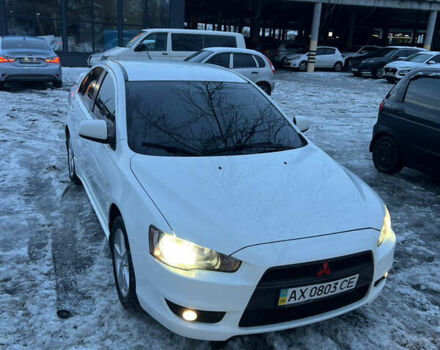 Белый Мицубиси Лансер, объемом двигателя 2 л и пробегом 185 тыс. км за 7600 $, фото 3 на Automoto.ua