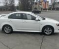 Білий Міцубісі Lancer, об'ємом двигуна 0 л та пробігом 34 тис. км за 9000 $, фото 1 на Automoto.ua