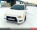 Білий Міцубісі Lancer, об'ємом двигуна 2 л та пробігом 210 тис. км за 7500 $, фото 4 на Automoto.ua