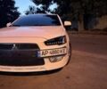 Білий Міцубісі Lancer, об'ємом двигуна 2 л та пробігом 236 тис. км за 6500 $, фото 1 на Automoto.ua