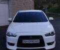 Білий Міцубісі Lancer, об'ємом двигуна 2 л та пробігом 150 тис. км за 8271 $, фото 1 на Automoto.ua