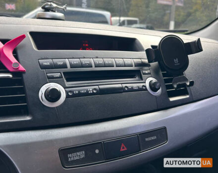 Мицубиси Лансер 2010 в Черновцах на Automoto.ua Белый Мицубиси Лансер, объемом двигателя 1.5 л и пробегом 220 тыс. км за 7700 $, фото 10 на Automoto.ua