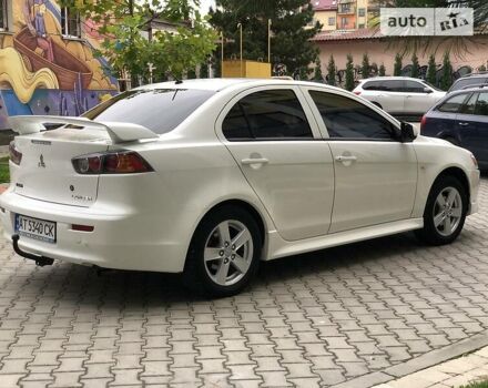 Білий Міцубісі Lancer, об'ємом двигуна 1.5 л та пробігом 140 тис. км за 7950 $, фото 23 на Automoto.ua