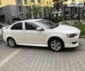 Білий Міцубісі Lancer, об'ємом двигуна 1.5 л та пробігом 140 тис. км за 7950 $, фото 46 на Automoto.ua