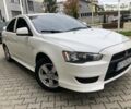 Білий Міцубісі Lancer, об'ємом двигуна 1.5 л та пробігом 140 тис. км за 7950 $, фото 1 на Automoto.ua