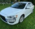 Білий Міцубісі Lancer, об'ємом двигуна 2 л та пробігом 165 тис. км за 9200 $, фото 20 на Automoto.ua