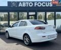 Білий Міцубісі Lancer, об'ємом двигуна 1.5 л та пробігом 245 тис. км за 6990 $, фото 4 на Automoto.ua