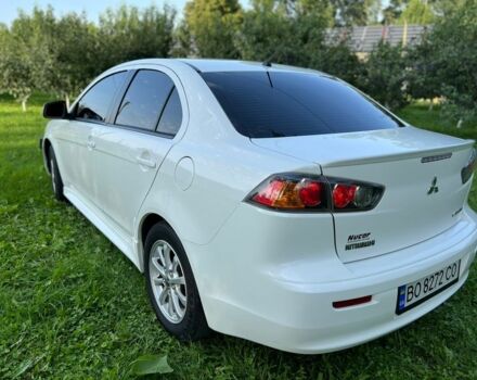 Білий Міцубісі Lancer, об'ємом двигуна 2 л та пробігом 165 тис. км за 9200 $, фото 9 на Automoto.ua