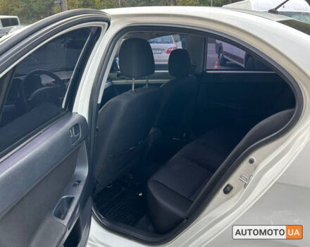 Мицубиси Лансер 2010 в Черновцах на Automoto.ua Белый Мицубиси Лансер, объемом двигателя 1.5 л и пробегом 220 тыс. км за 7700 $, фото 12 на Automoto.ua