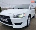 Белый Мицубиси Лансер, объемом двигателя 1.5 л и пробегом 232 тыс. км за 6600 $, фото 1 на Automoto.ua