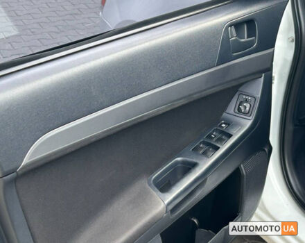 Мицубиси Лансер 2010 в Черновцах на Automoto.ua Белый Мицубиси Лансер, объемом двигателя 1.5 л и пробегом 220 тыс. км за 7700 $, фото 8 на Automoto.ua