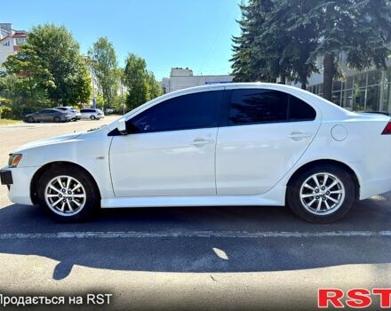 Белый Мицубиси Лансер, объемом двигателя 2 л и пробегом 240 тыс. км за 7500 $, фото 1 на Automoto.ua