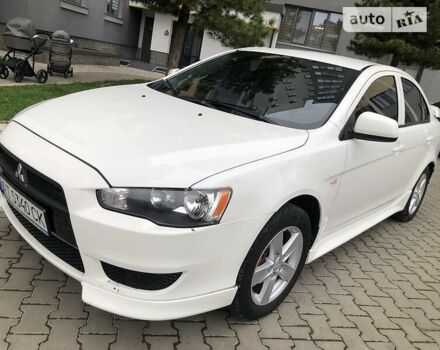 Білий Міцубісі Lancer, об'ємом двигуна 1.5 л та пробігом 140 тис. км за 7950 $, фото 39 на Automoto.ua