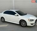 Білий Міцубісі Lancer, об'ємом двигуна 2 л та пробігом 249 тис. км за 5999 $, фото 7 на Automoto.ua