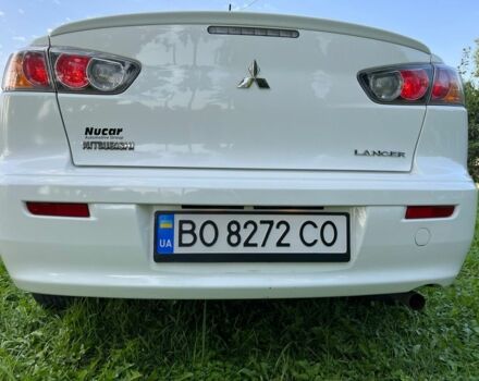 Білий Міцубісі Lancer, об'ємом двигуна 2 л та пробігом 165 тис. км за 9200 $, фото 11 на Automoto.ua