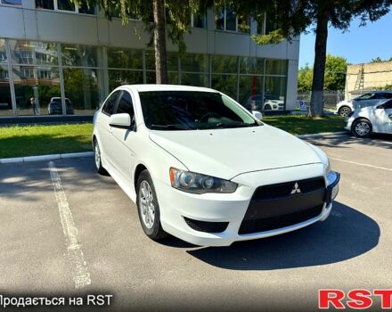 Белый Мицубиси Лансер, объемом двигателя 2 л и пробегом 240 тыс. км за 7500 $, фото 3 на Automoto.ua