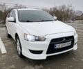 Белый Мицубиси Лансер, объемом двигателя 1.5 л и пробегом 232 тыс. км за 6400 $, фото 1 на Automoto.ua