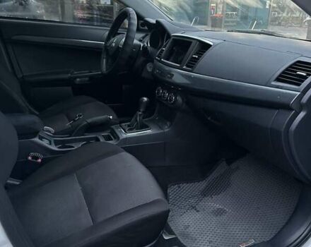 Білий Міцубісі Lancer, об'ємом двигуна 2 л та пробігом 225 тис. км за 7800 $, фото 12 на Automoto.ua