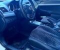 Білий Міцубісі Lancer, об'ємом двигуна 1.5 л та пробігом 218 тис. км за 6000 $, фото 3 на Automoto.ua