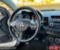 Білий Міцубісі Lancer, об'ємом двигуна 20 л та пробігом 183 тис. км за 9899 $, фото 4 на Automoto.ua